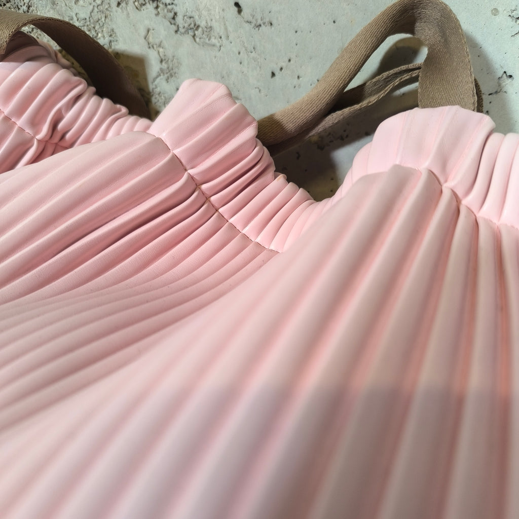 Bolso saco plisado rosa Marco Nicoli