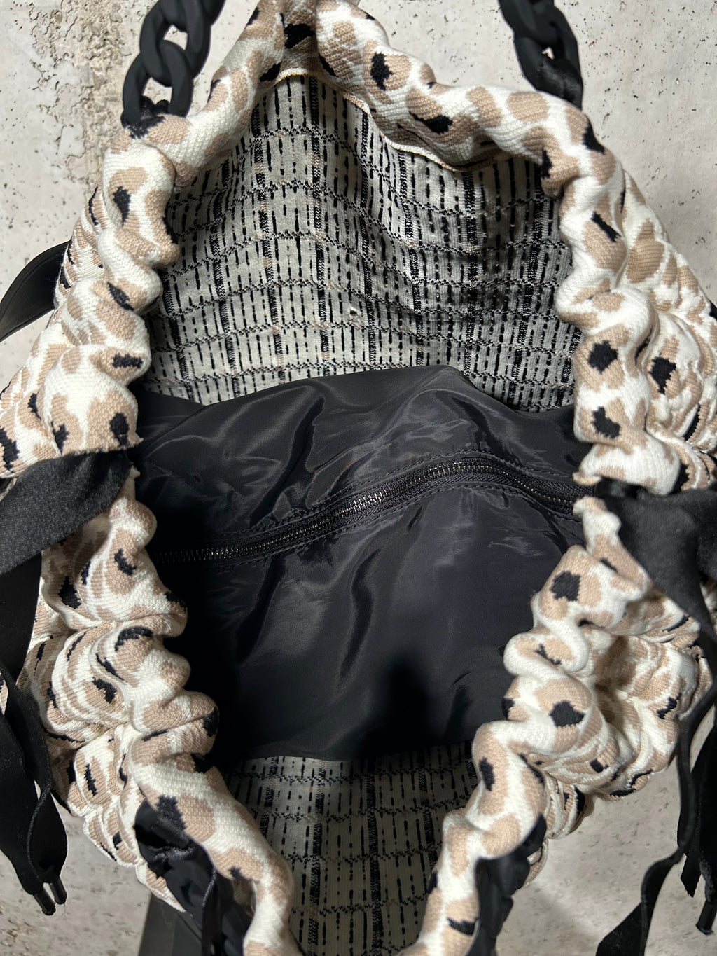 Bolso bowling acolchado animal print Fri-Yay