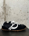 Zapatilla deportiva en negro Palomitas